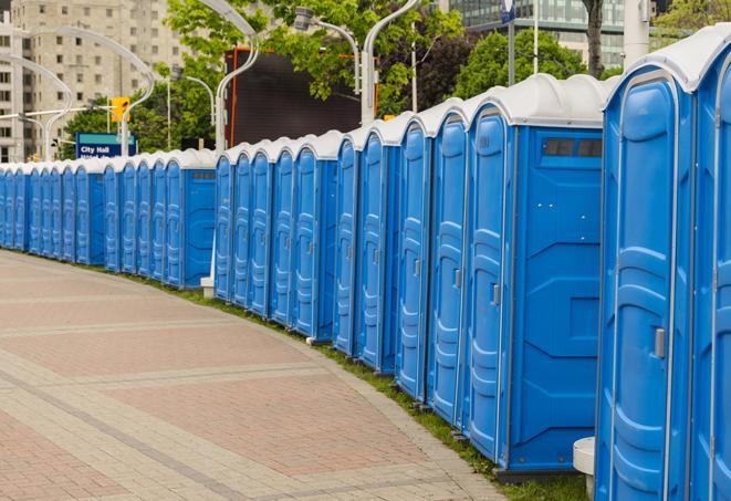a row of portable restrooms at a fairground, offering visitors a clean and hassle-free experience in clinton