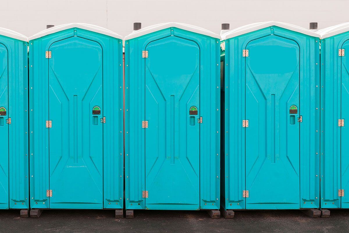 Industrial portable restroom units at a plant in Tulsa, Oklahoma